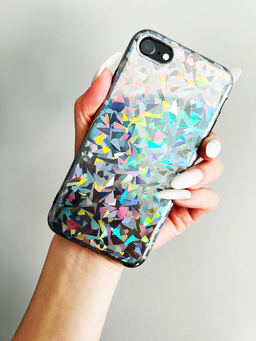 Holding Up KokoLoveCo Laser Focus Holographic iPhone Case in front of grey wall