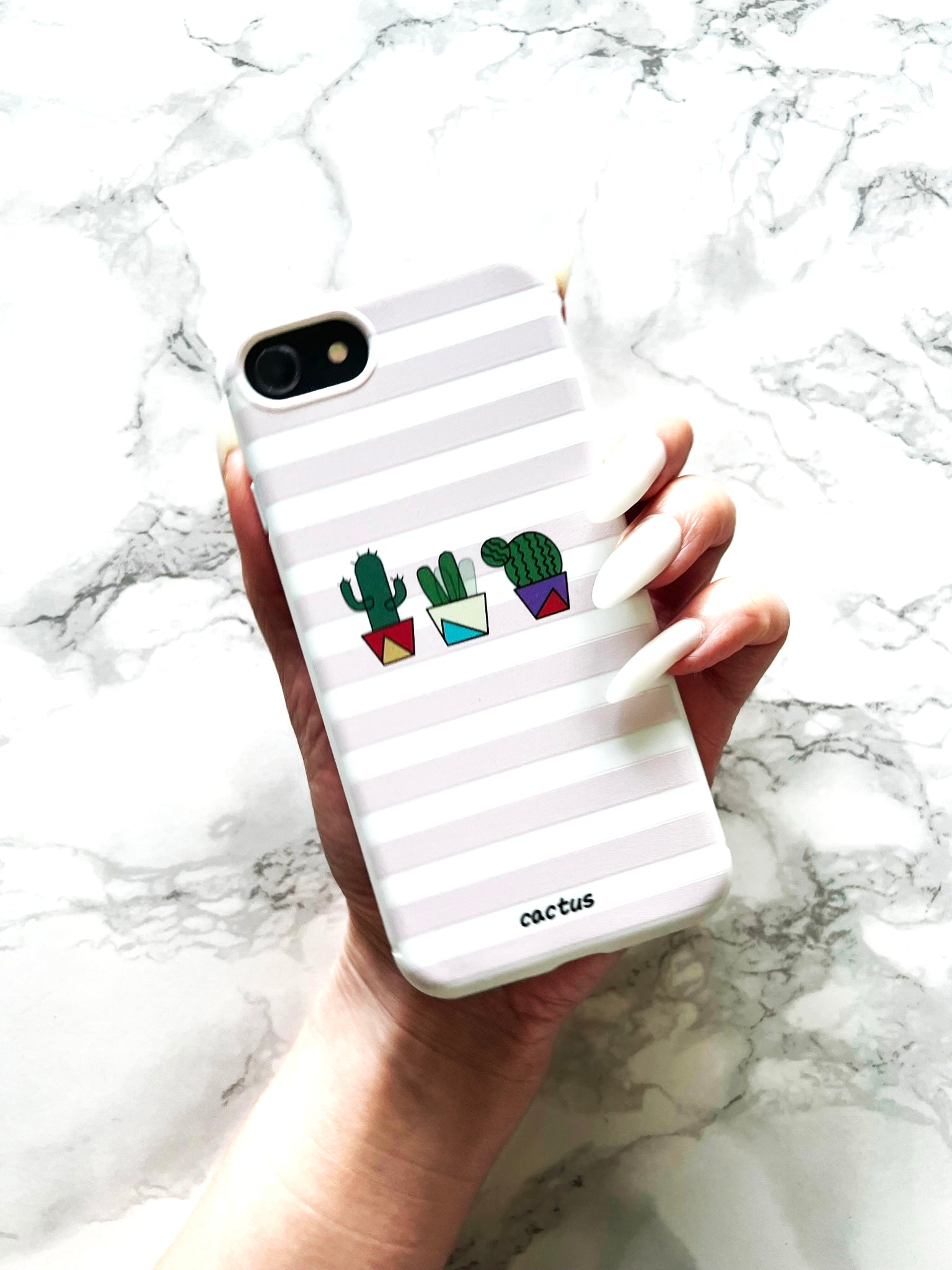 Happy Cactus Days with Pink Strips iPhone Case on marble top